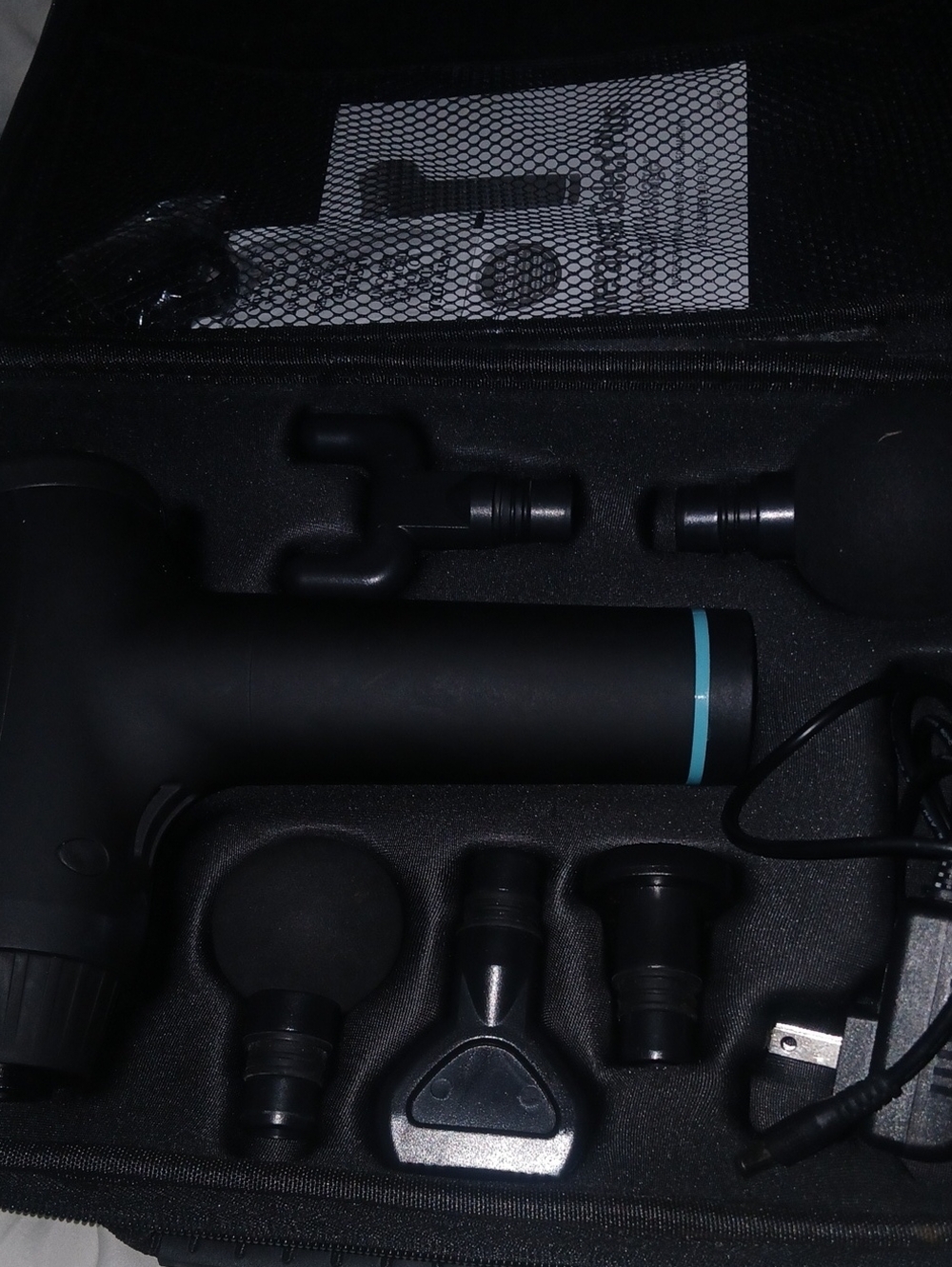 Homedics Black Massage Gun with Teal Accent and Multiple Heads